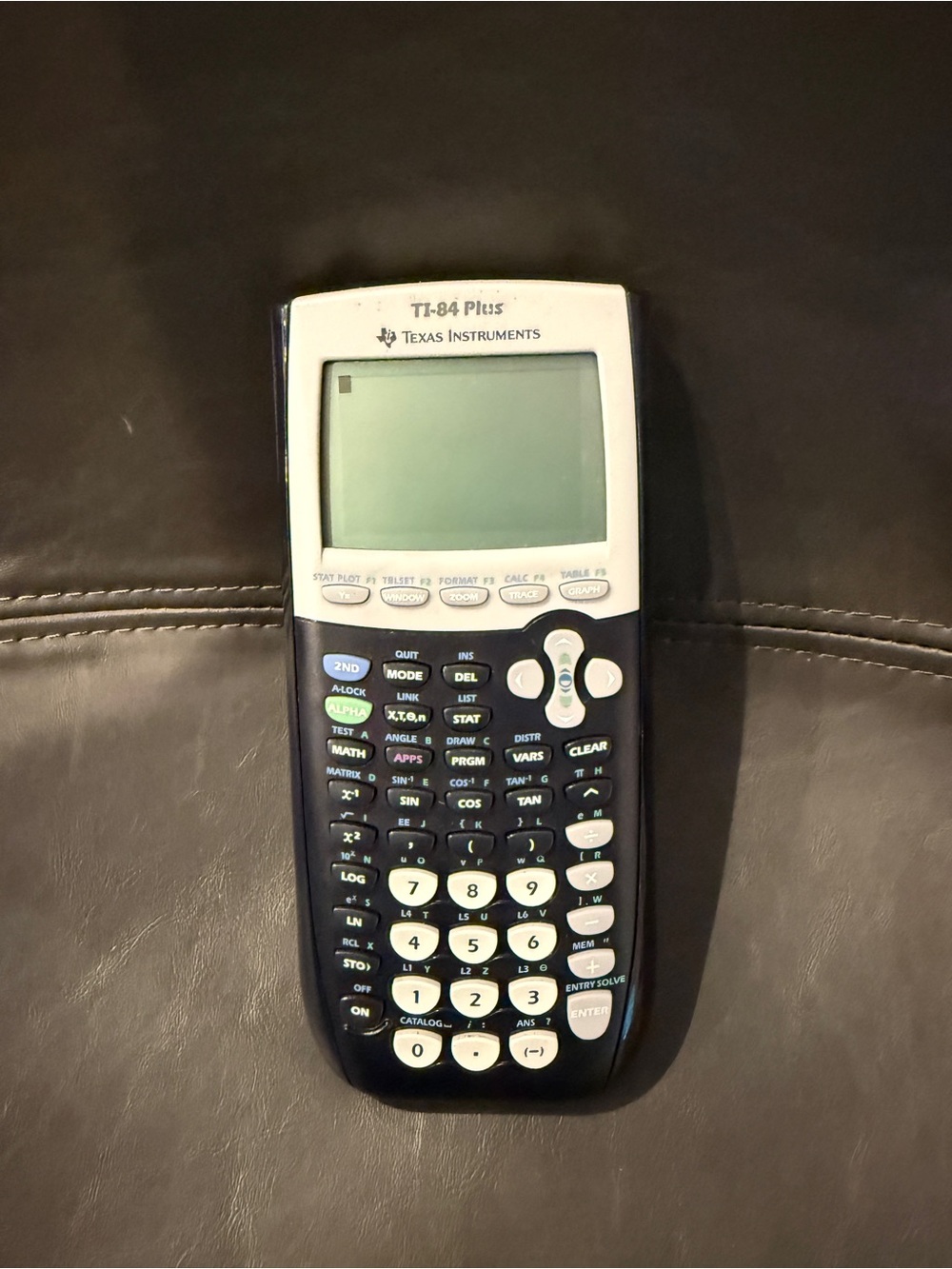 Texas Instruments TI-84 Plus Graphing Calculator in Black and White